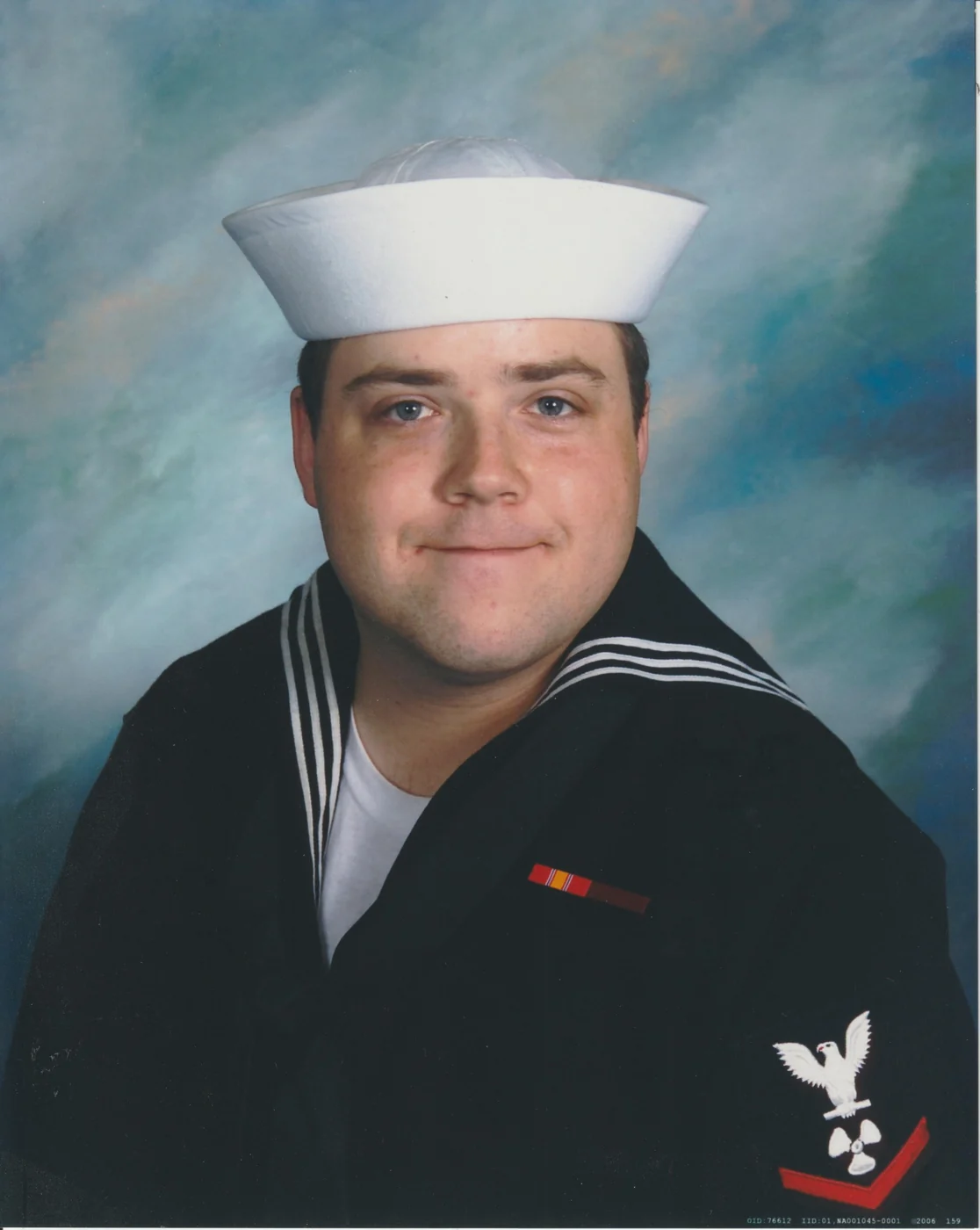 Brandon Sweitzer in a U.S. Navy enlisted dress uniform